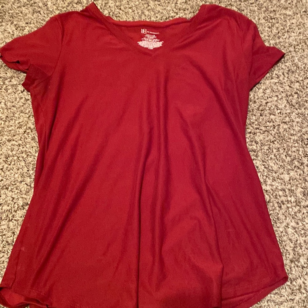 It’s a comfy and soft shirt and more tight fitting